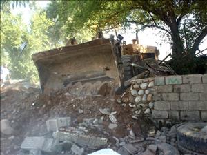 تخریب بناهای غیرمجاز در حاشیه رودخانه دز